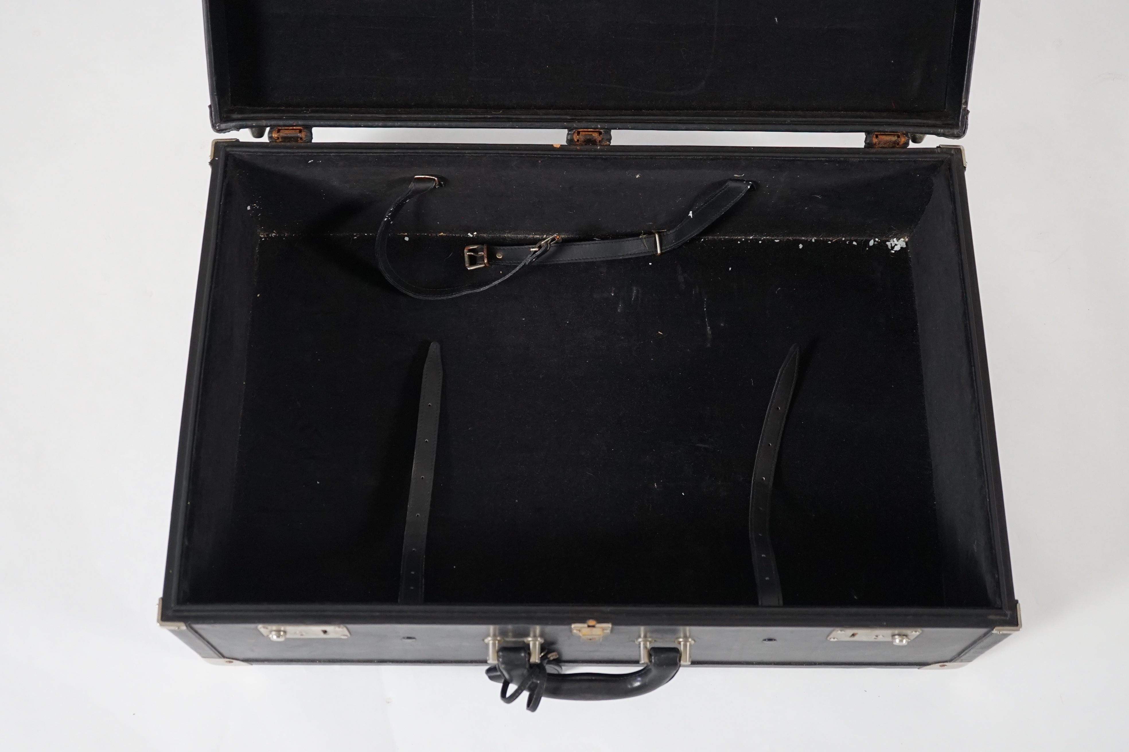 A Nina Cerruti black leather suitcase Length 64.5cm, depth 22cm, width 42cm